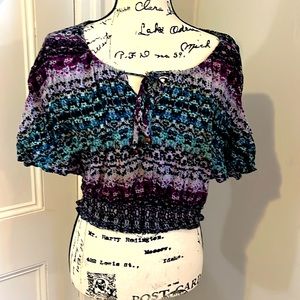 Purple, teal and black bat wing ribbed waist top. Perfect for spring or summer.